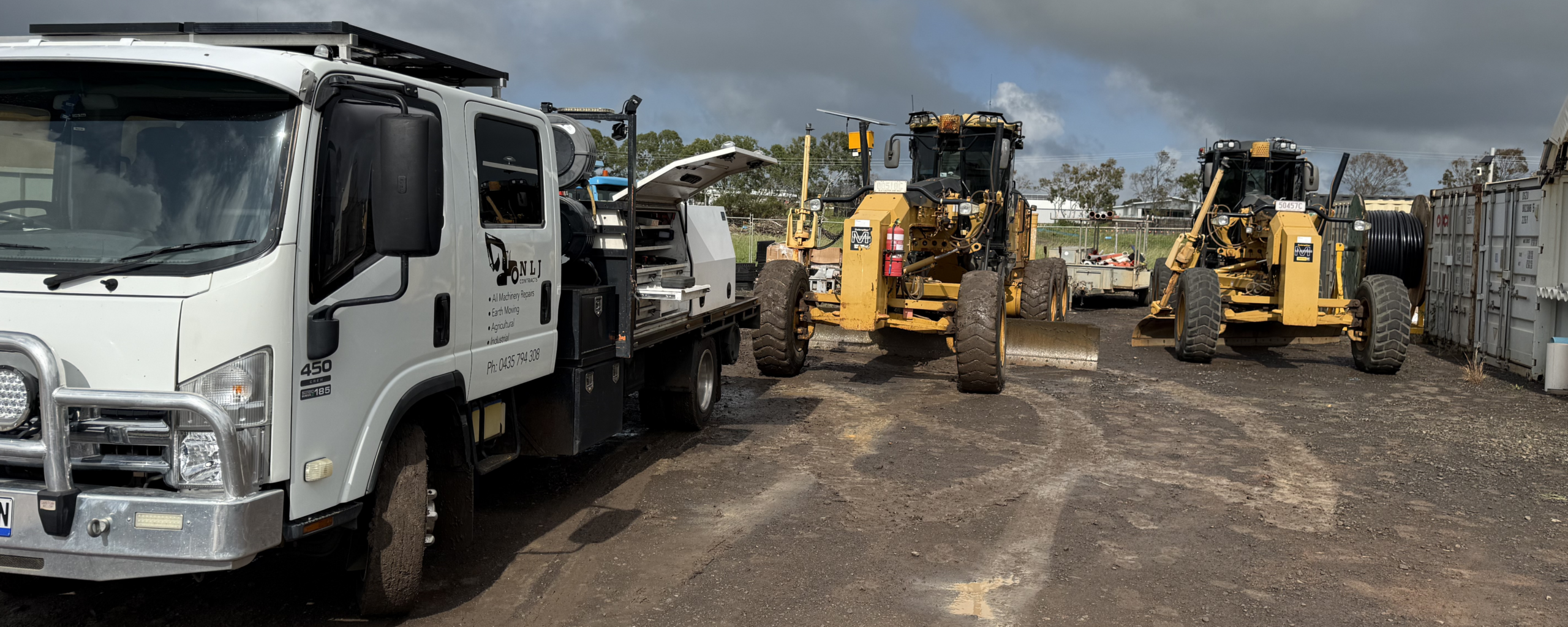 Fleet of trucks and heavy machinery lined up for diesel mechanical servicing and maintenance by NLJ Contracts
